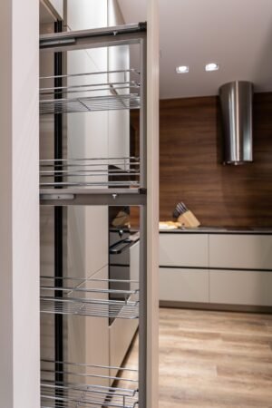 Compact Walnut Kitchen Hamburg — VIBO pull-out pantry with chrome wire baskets